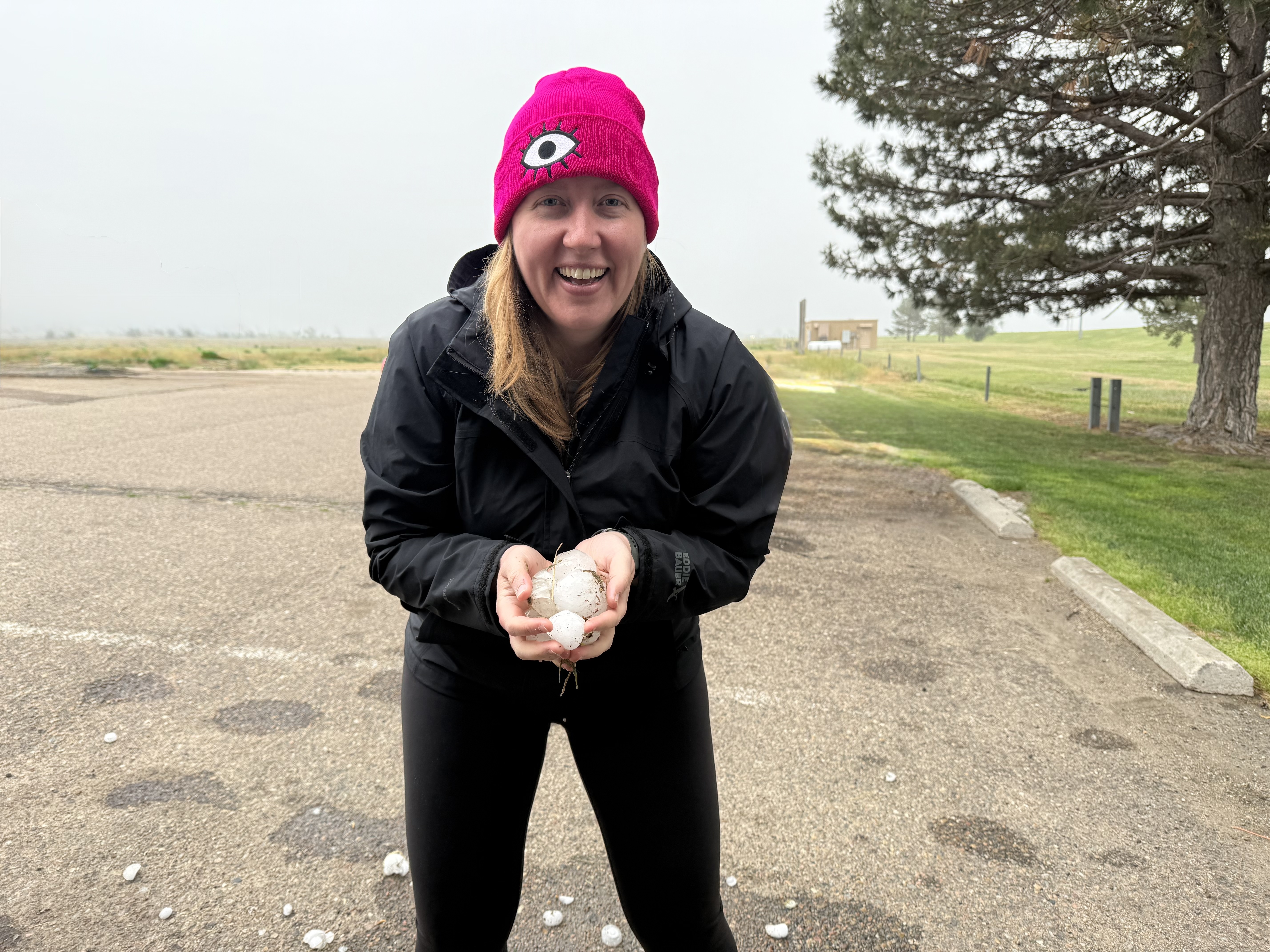 Cait Roufa holding hail - Photo by Cait Roufa